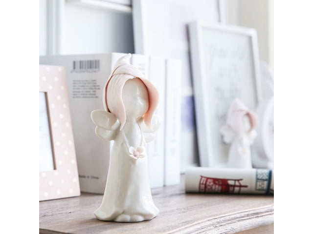 Vista de Angel de rosas con flor pequeña juego té de rosas
