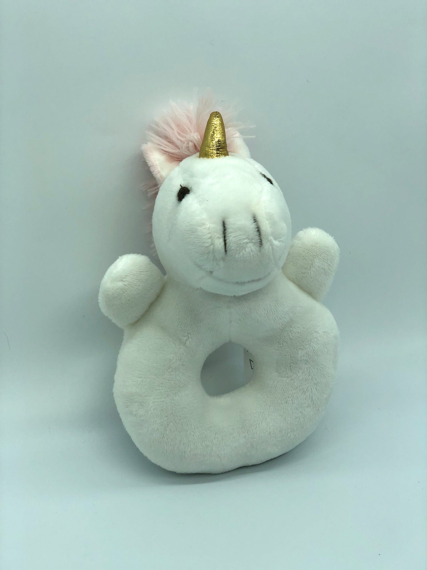 Vista de Pack sonajero unicornio cuadrille rosado