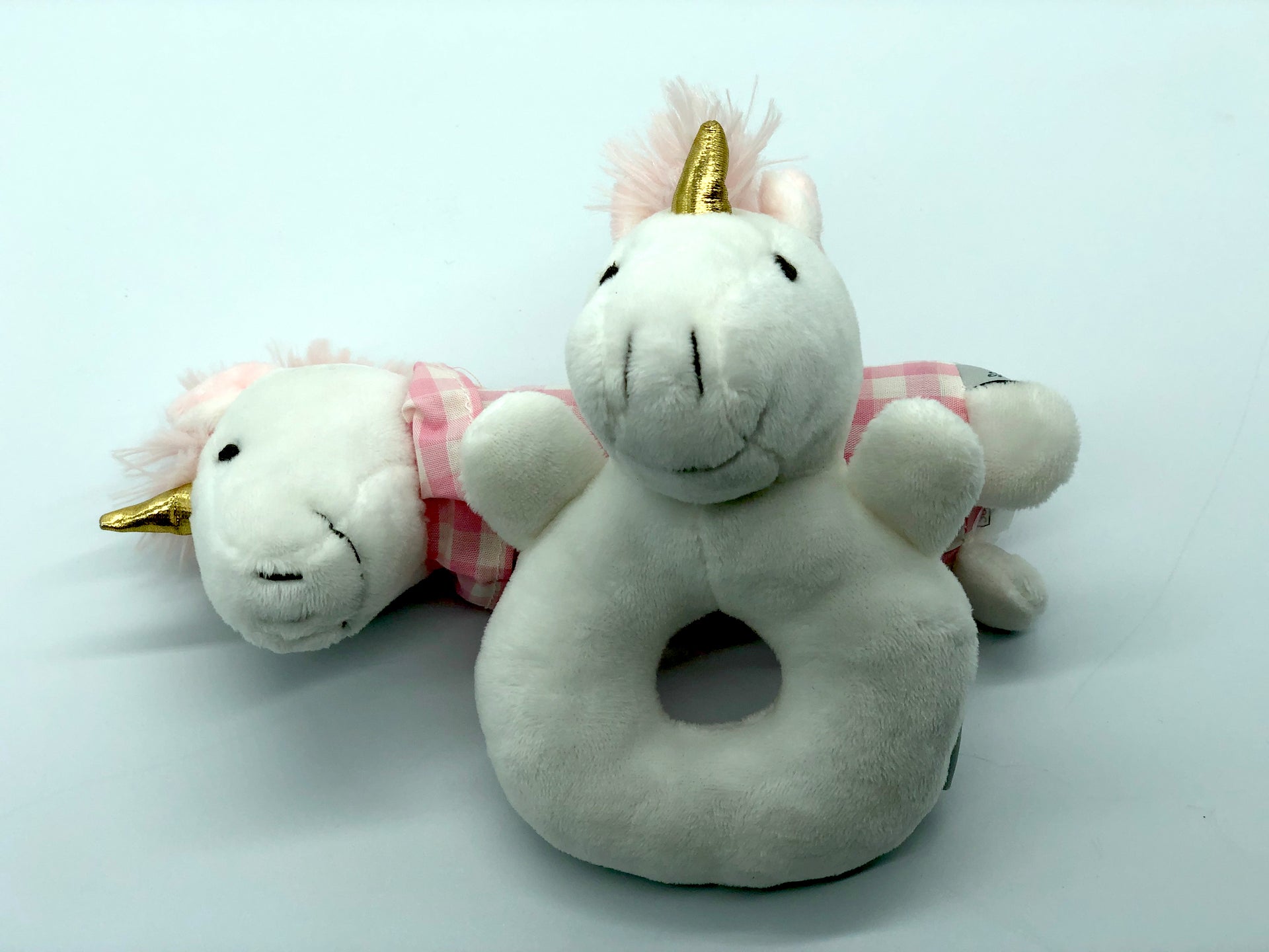 Vista de Pack sonajero unicornio cuadrille rosado